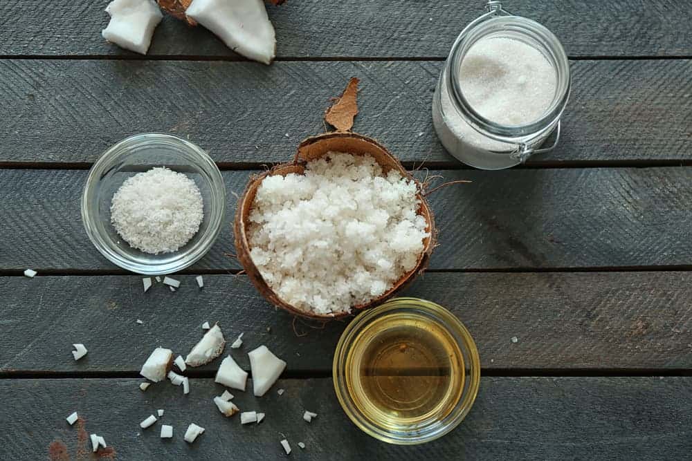 Natural scrub ingredients on wooden background