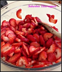 fresh sliced strawberries in a bowl