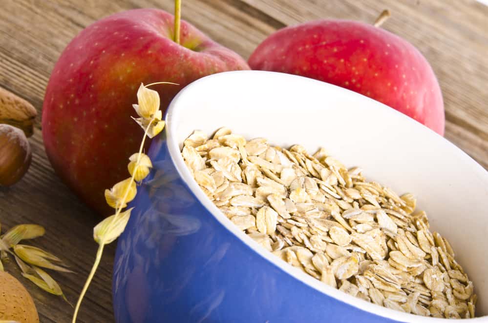 bowl of oatmeal and apples