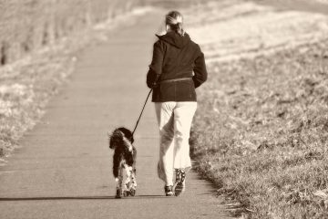 woman running with dog