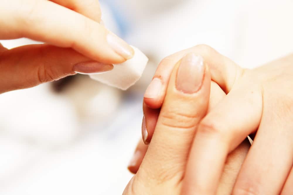 Studio nail - beautician polishing nails