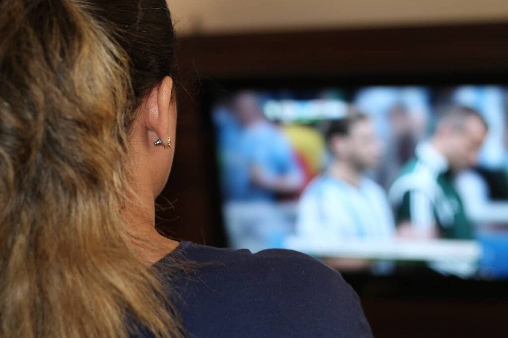 teenager watching television