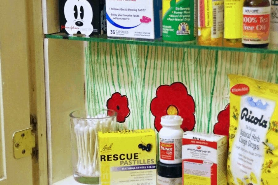 Organized medicine cabinet with medicine