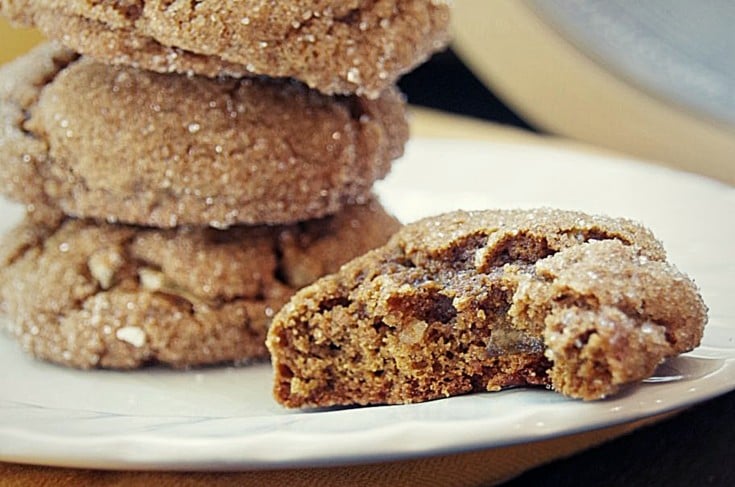 chewy ginger snap cookies on a white plate