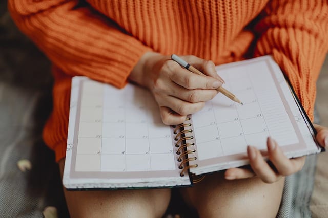 woman planning with a calendar