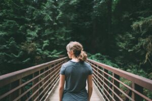 girl hiking in woods
