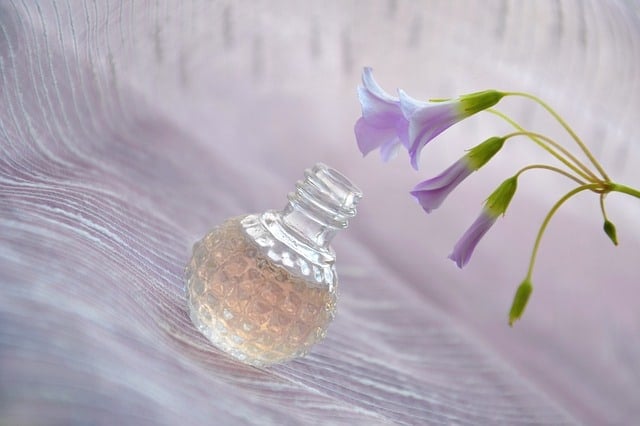 perfume bottle and flowers