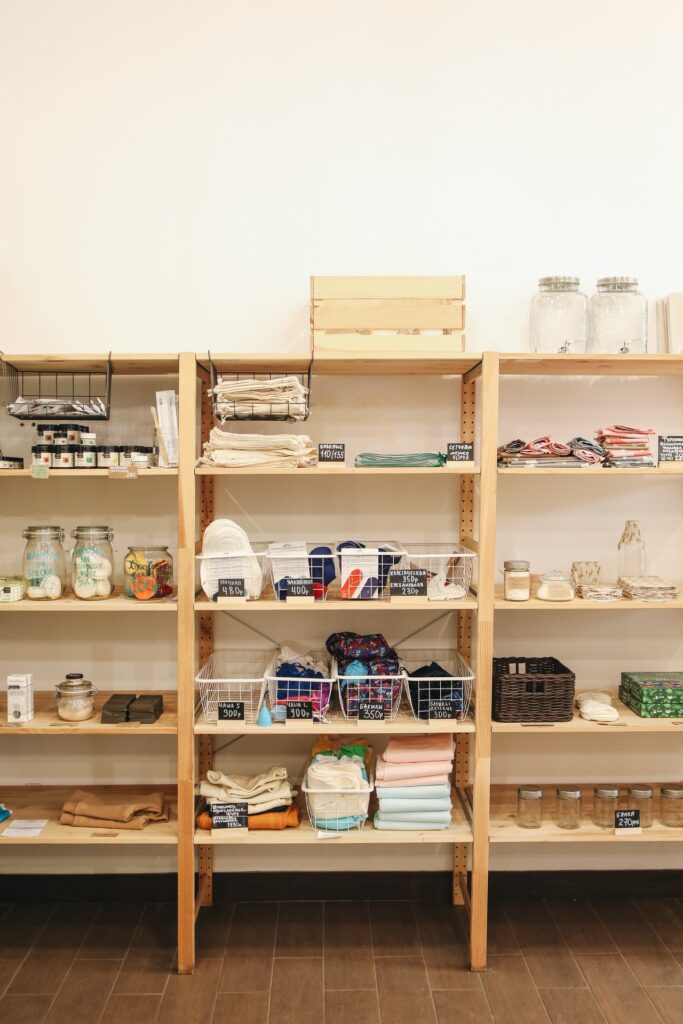 wooden shelves with storage containers for clutter