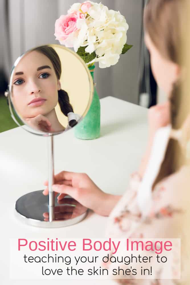 Girl looking in mirror