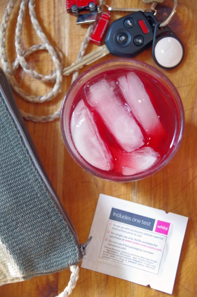 Undercover Colors SipChip and Cocktail on wooden table with keys and purse