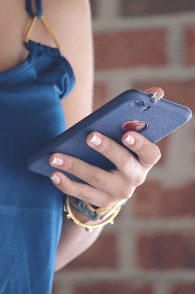 young woman using cell phone