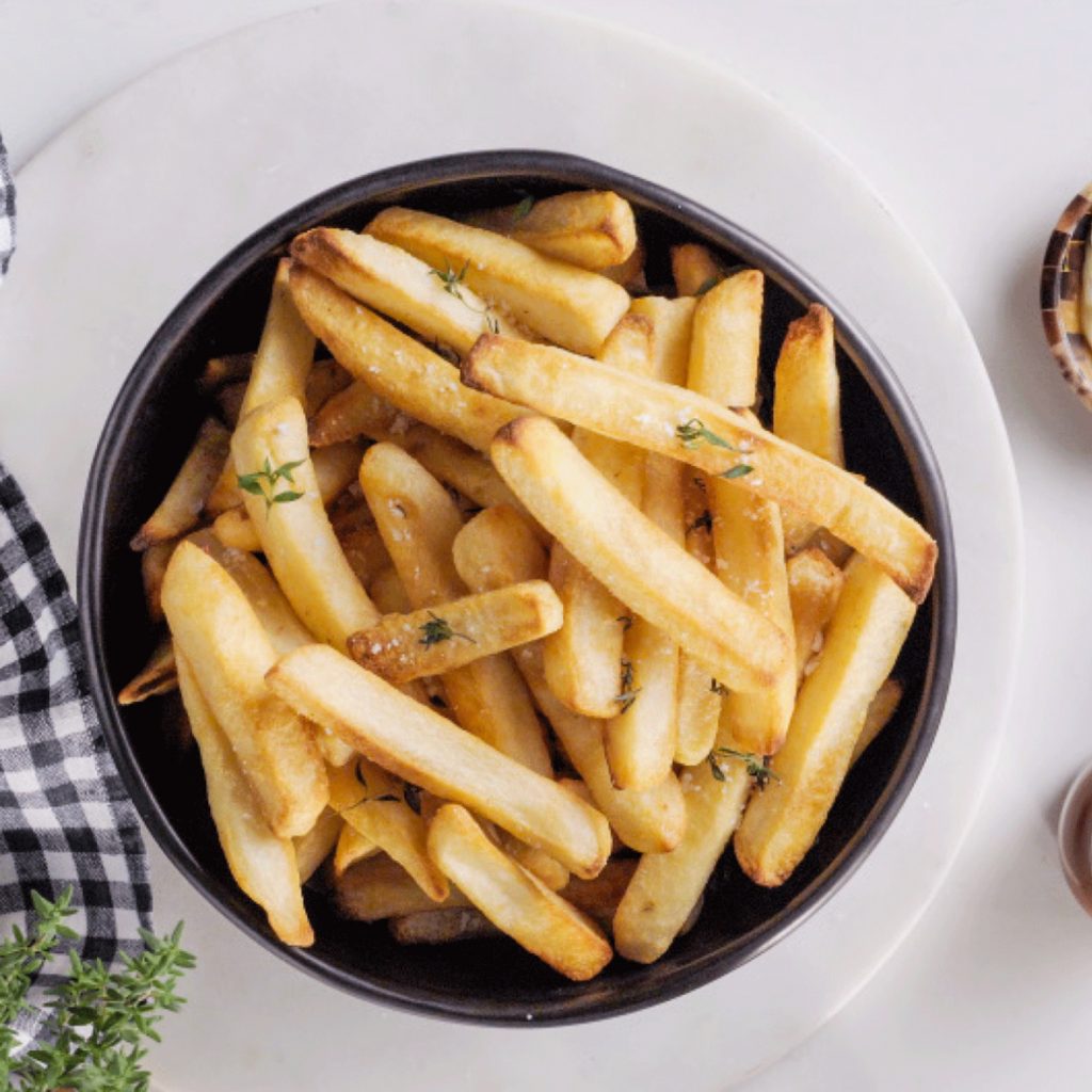 bowl of french fries cooked in the microwave oven 