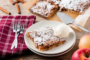 grated apple tart on plate with icecream