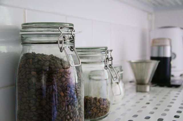 coffee beans in jar on kitchen counters