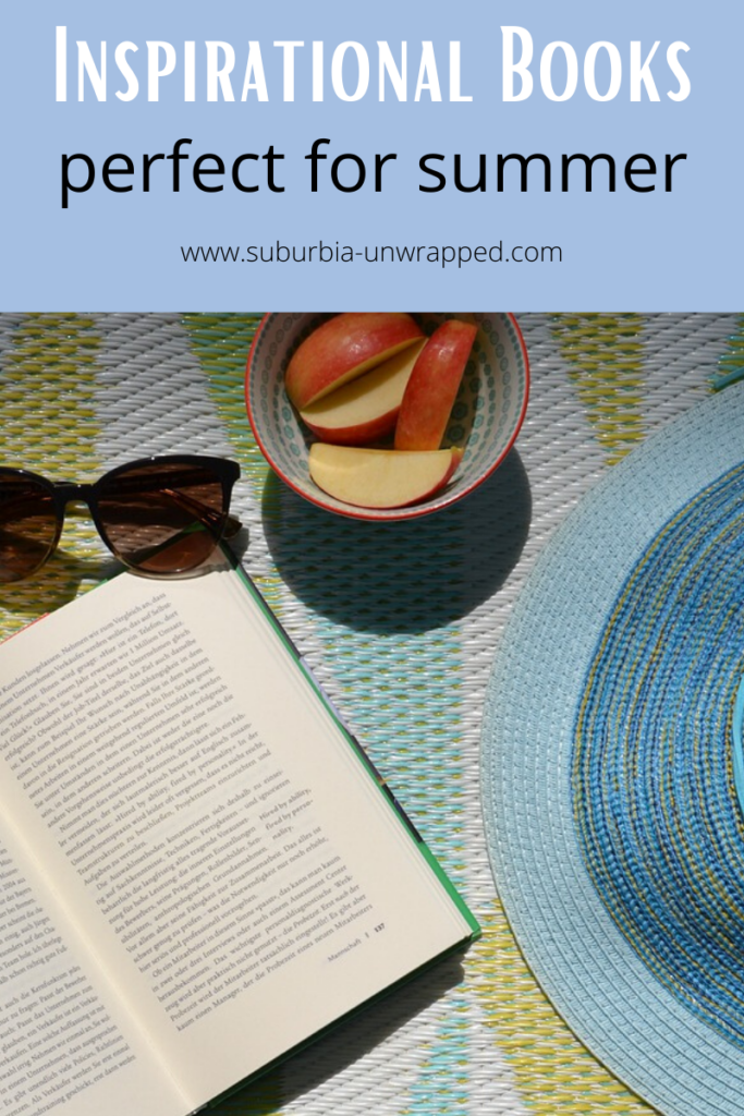 open book on beach towel with summer hat and sun glasses and text overlay 'Inspirational Books perfect for summer'