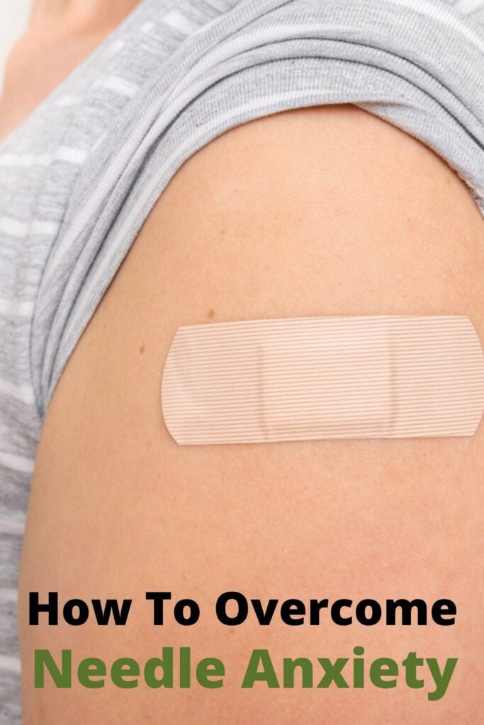 arm with band aid after vaccination and text overlay how to overcome needle anxiety