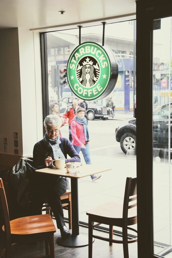 woman sitting in coffee shop